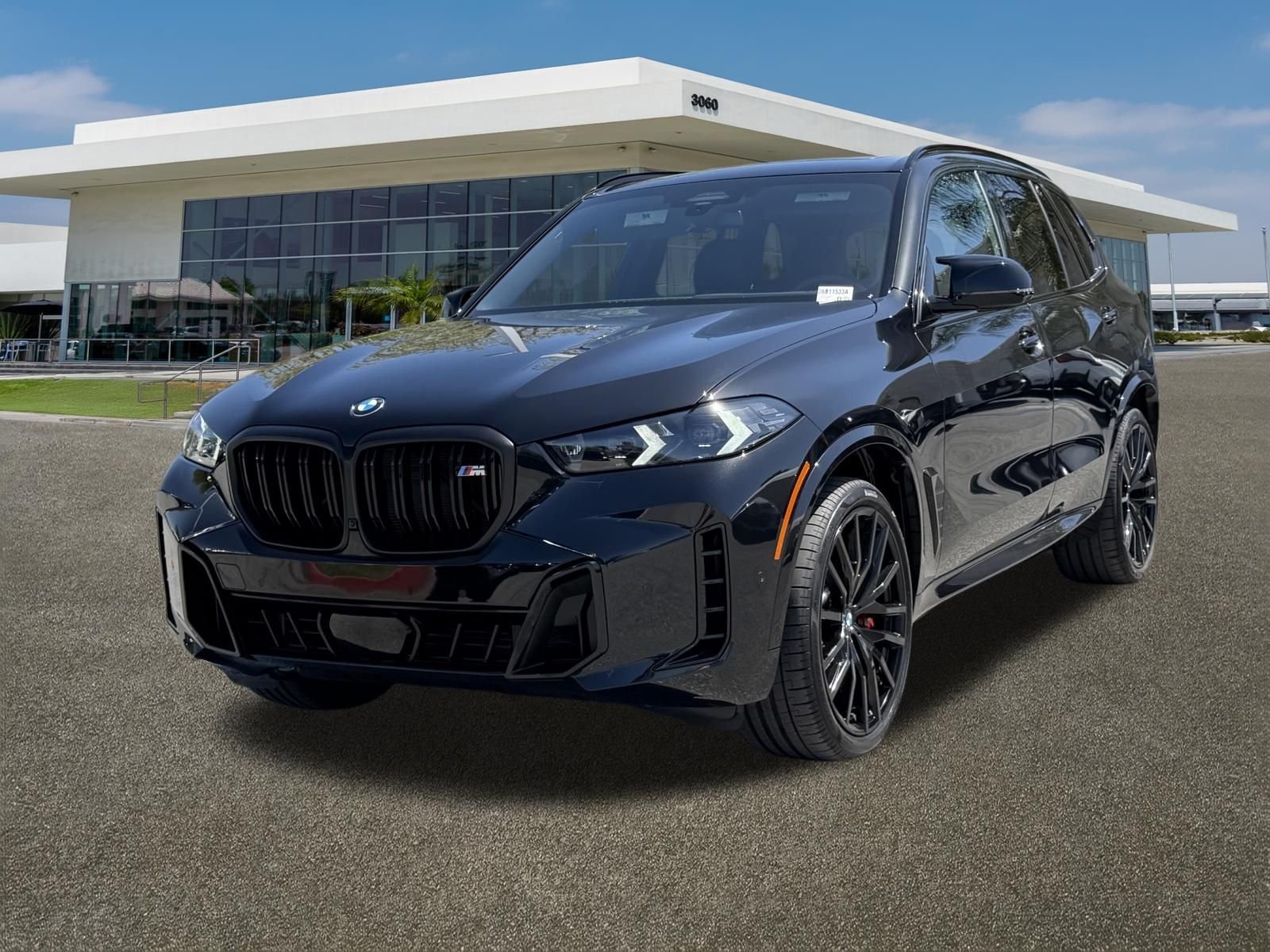 Used 2026 Black Sapphire Metallic BMW M60i image 4