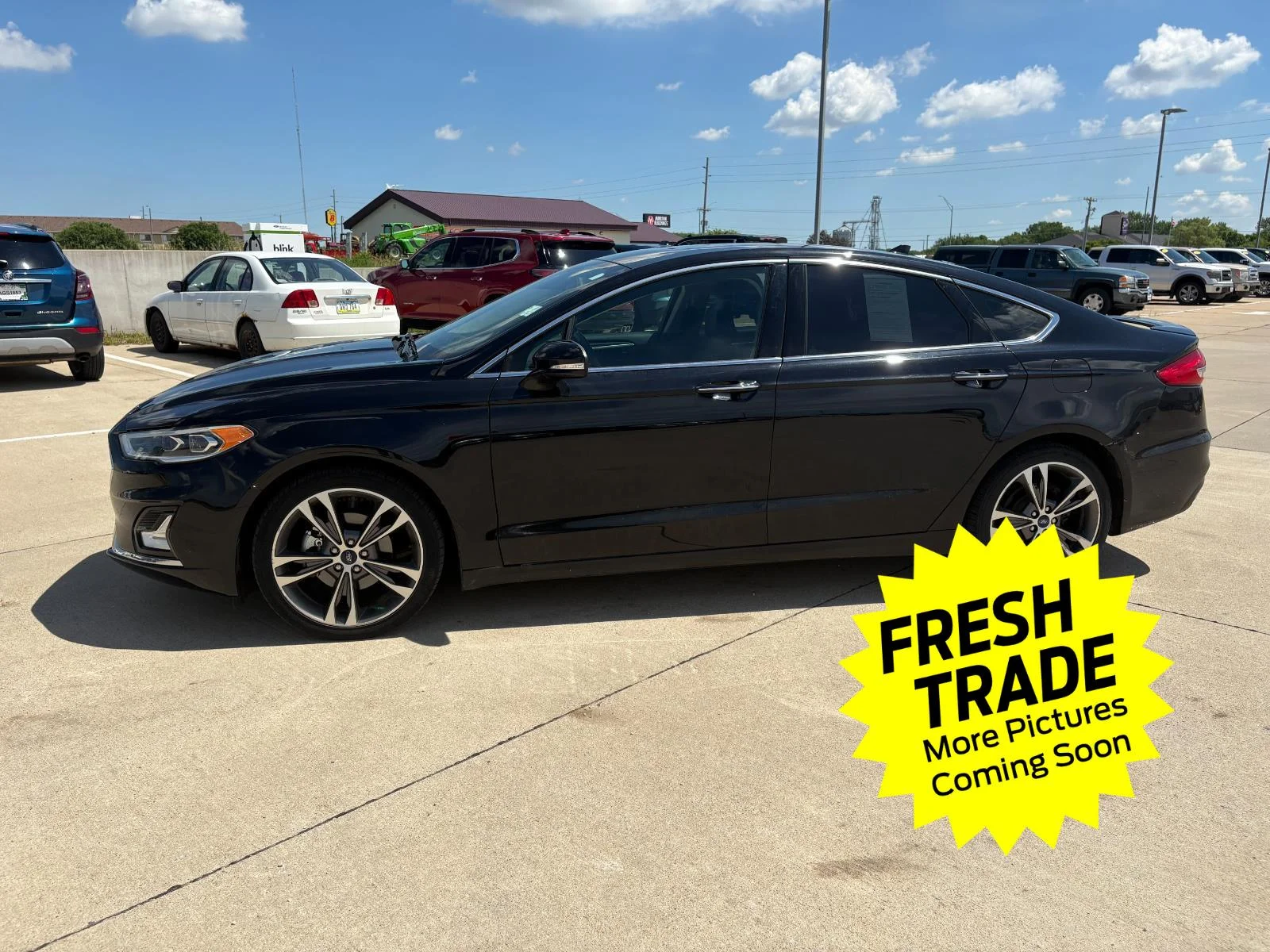 Used 2020 Agate Black Ford Titanium image 1