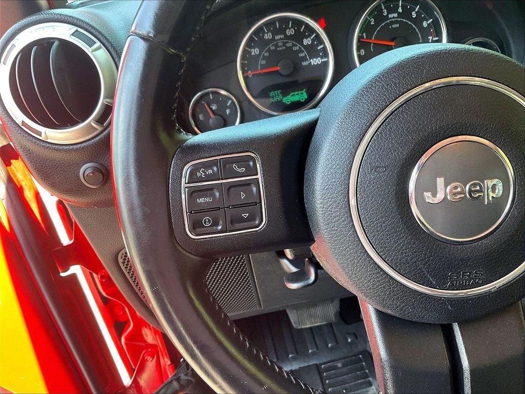 Used 2015 Red Jeep Unlimited Sahara image 22