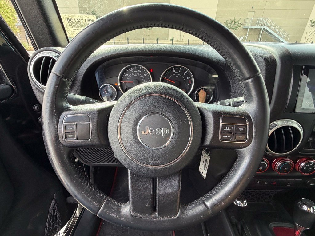 Used 2018 Black Jeep Unlimited Sahara image 13