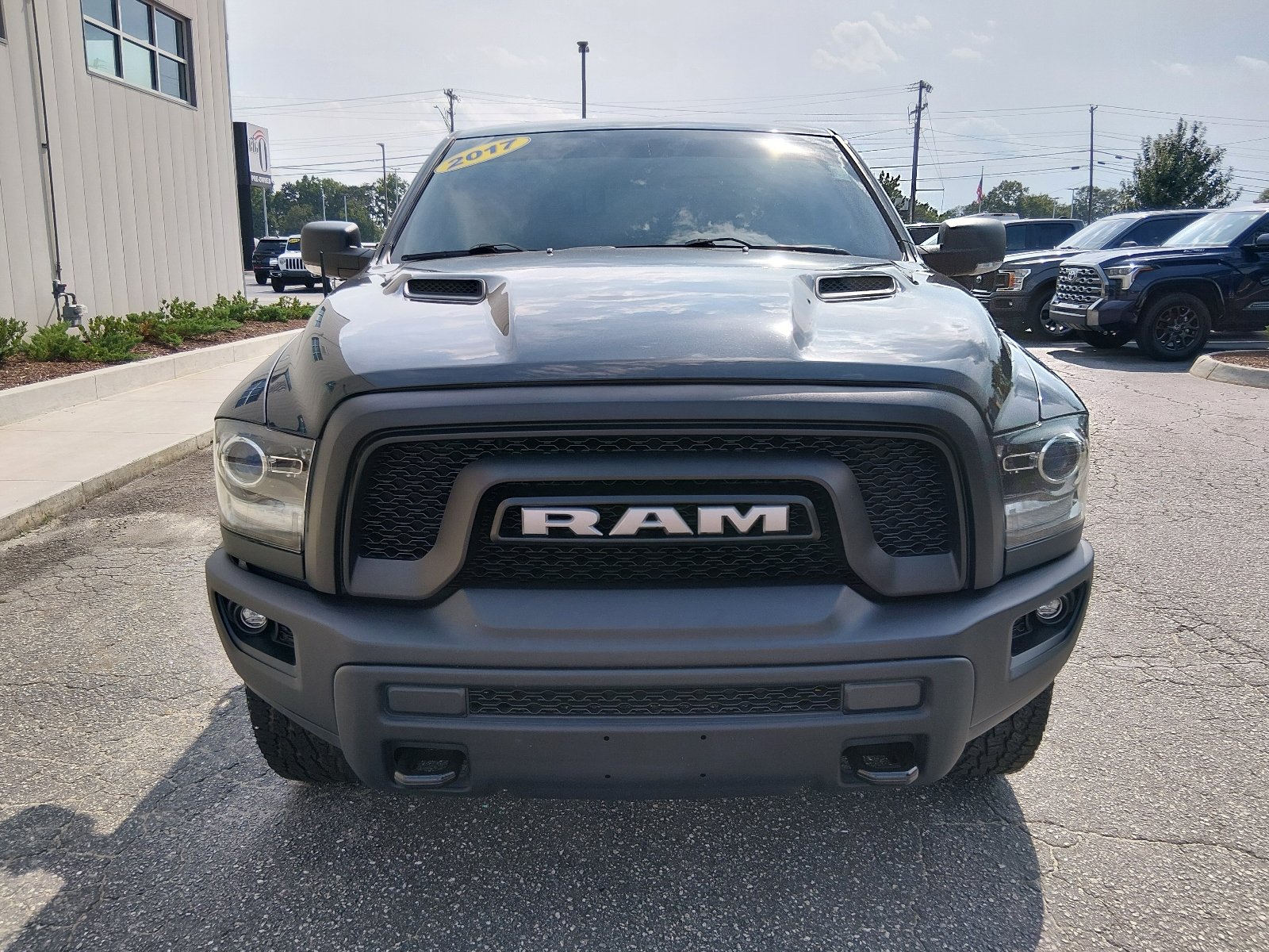 Used 2017 Brilliant Black Crystal Pearl Coat Ram 4x4 Rebel 4dr Crew Cab 5.5 ft. SB Pickup image 8