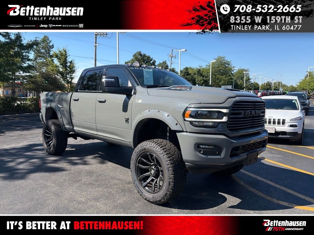 Used 2024 Diamond Black Ram Laramie image 1