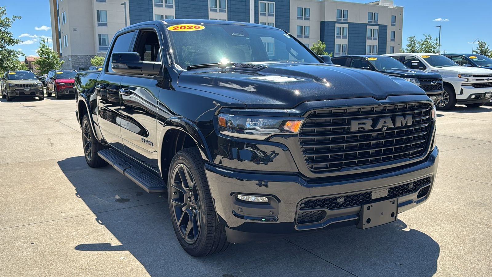 New 2026 Diamond Black Crystal Pearl-Coat Exterior Paint RAM Laramie image 2