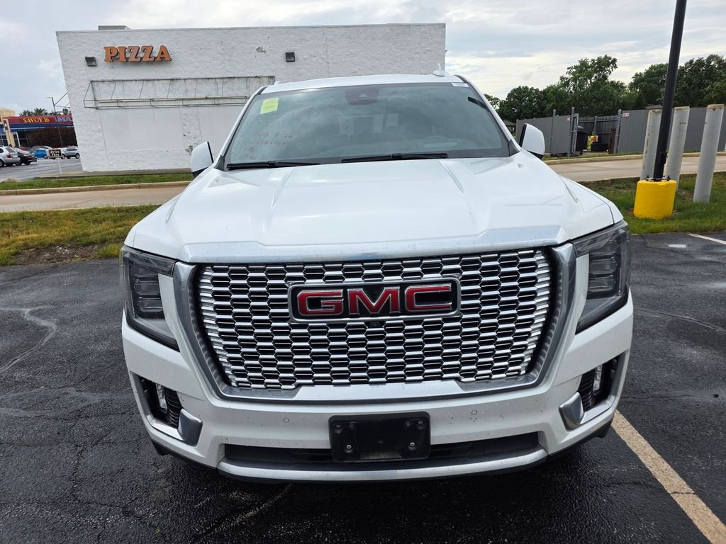 Used 2023 White Frost Tricoat GMC Denali image 1