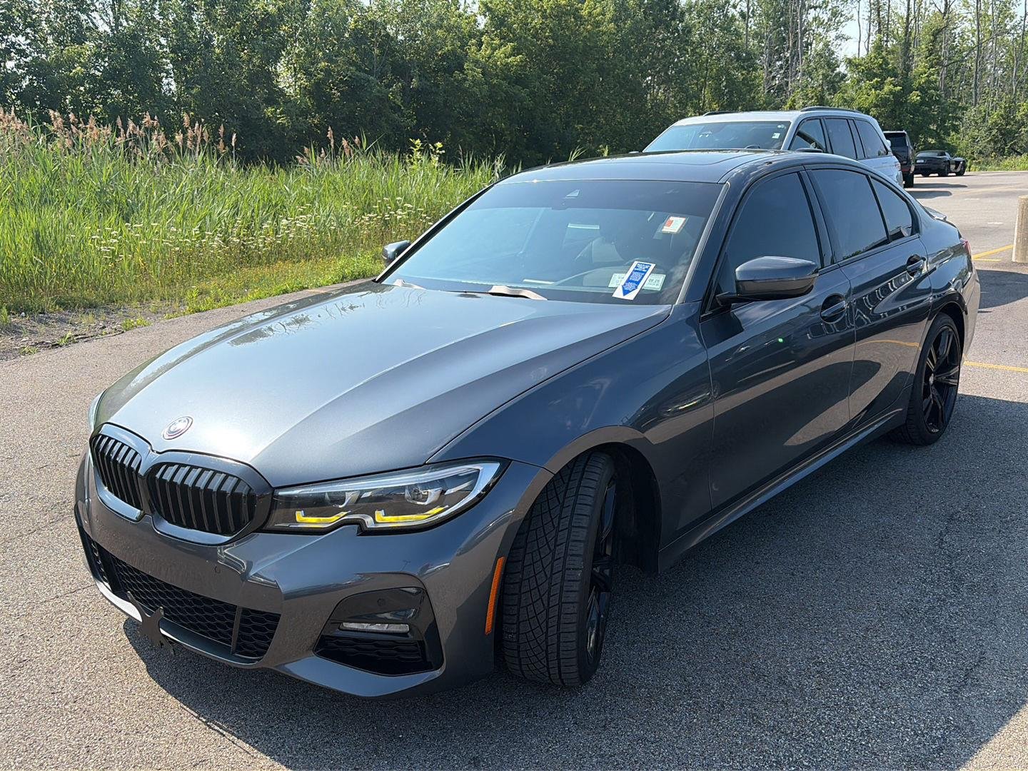 Used 2022 Mineral Grey Metallic BMW 330i xDrive image 4