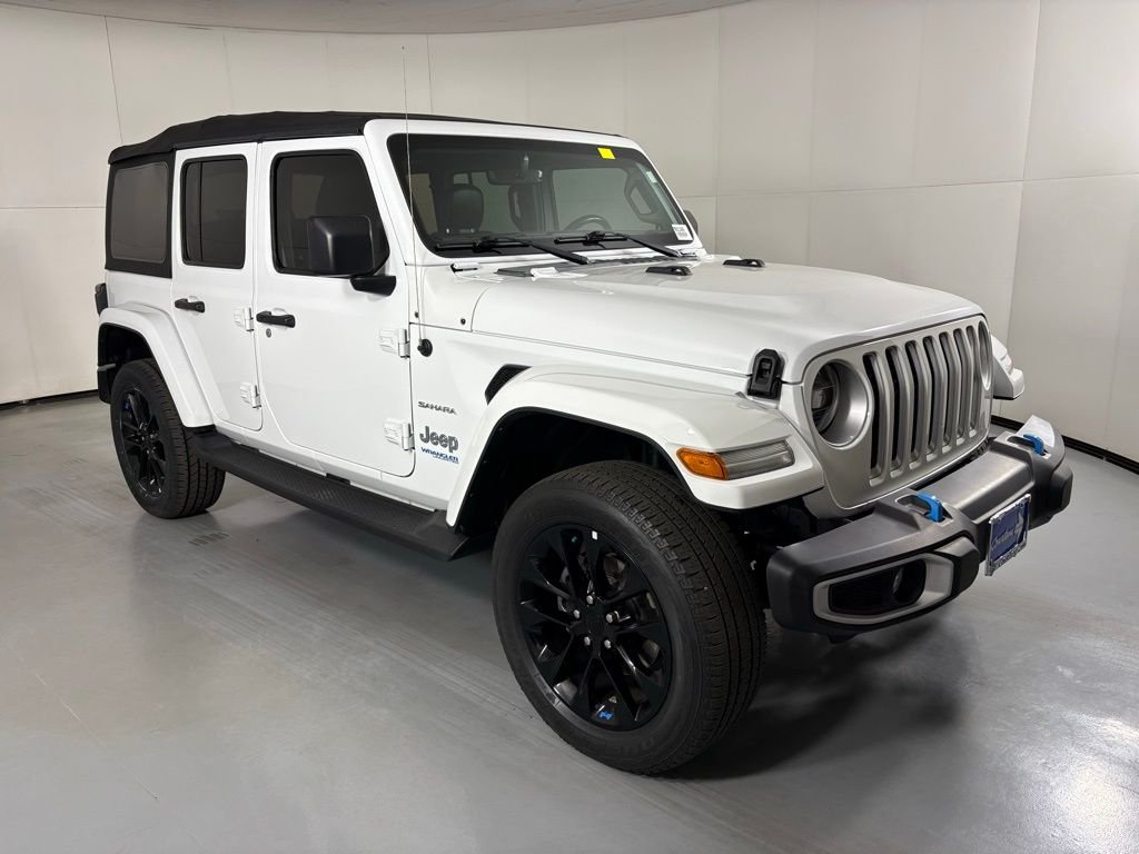Used 2022 Jeep Wrangler Unlimited Sahara 4XE with VIN 1C4JJXP62NW123954 for sale in Scottsdale, AZ