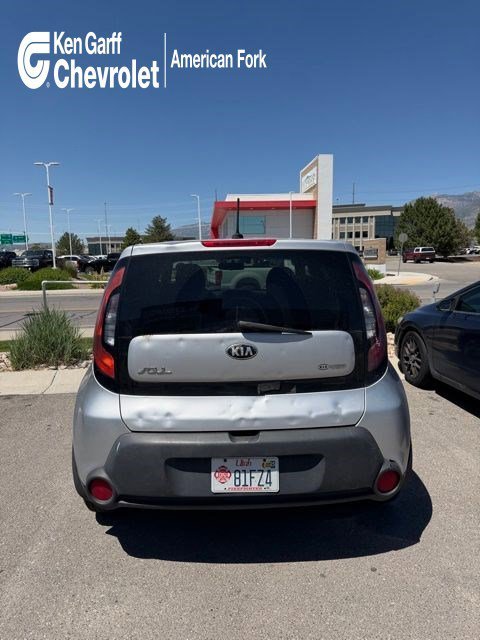 Used 2014 Bright Silver Kia Base image 1