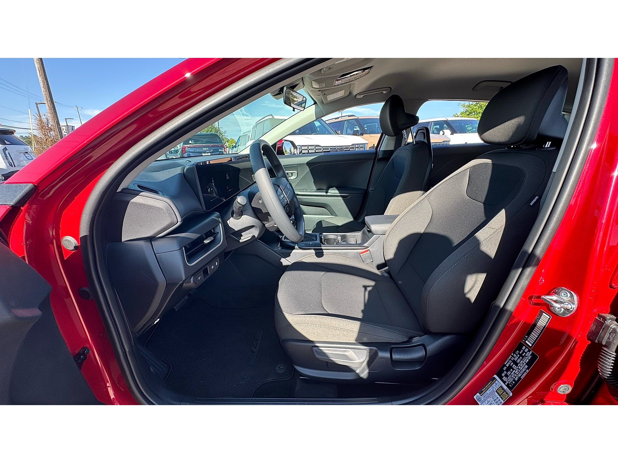 New 2026 Currant Red Kia LXS image 8