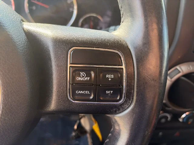 Used 2015 Orange Jeep Unlimited Sport image 17