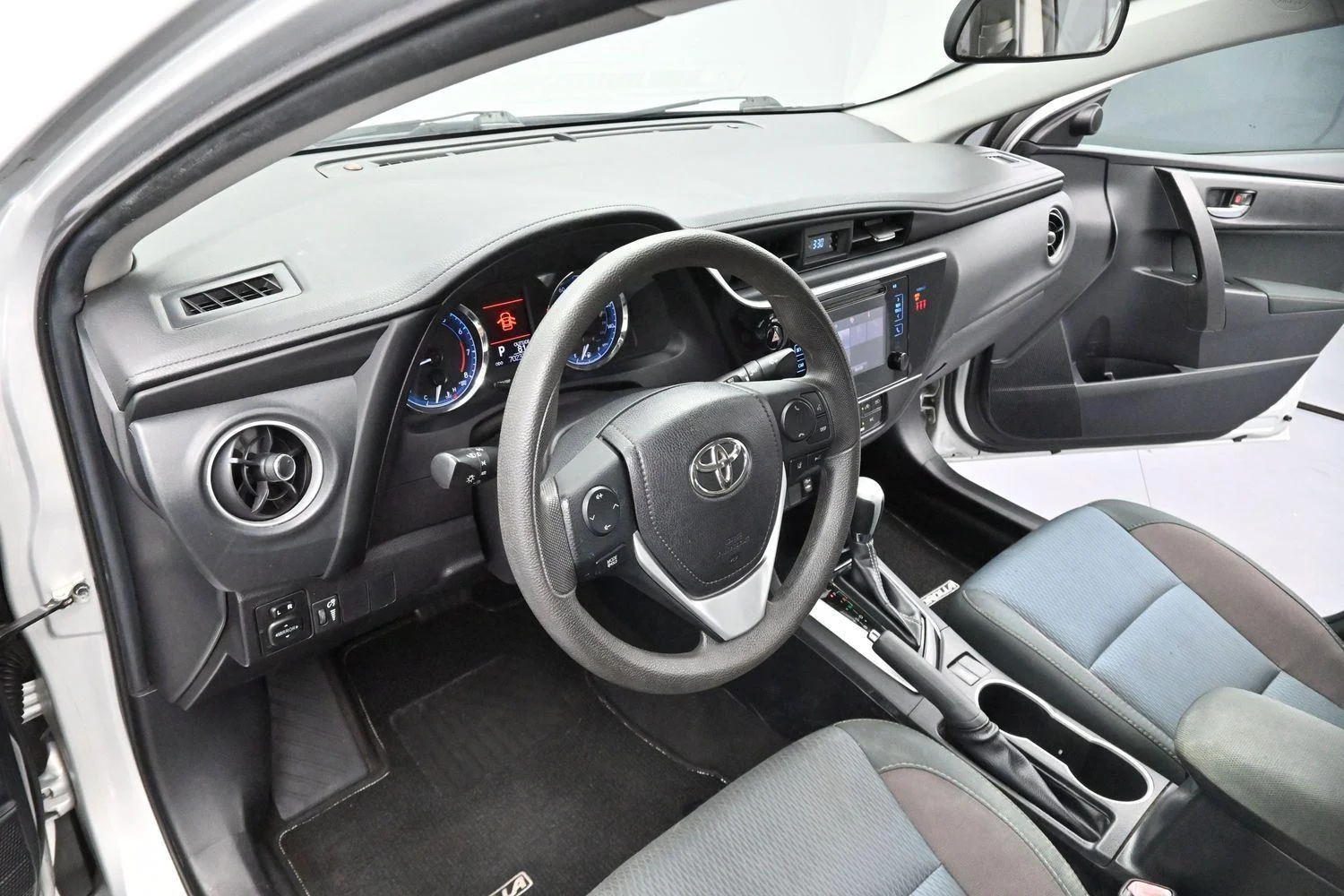 Used 2019 Classic Silver Metallic Toyota LE image 12