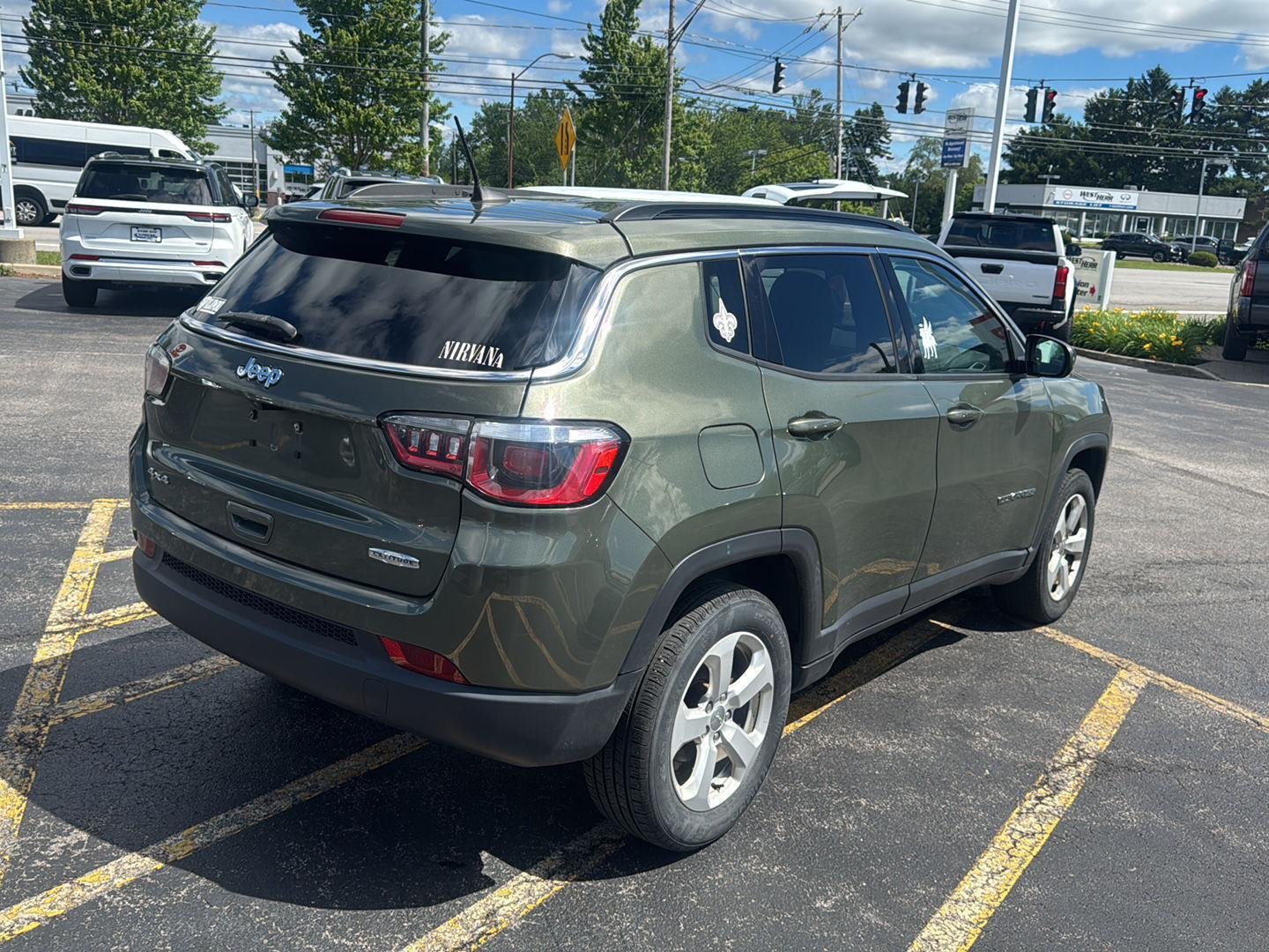 Used 2019 Olive Green Pearlcoat Jeep Latitude image 6