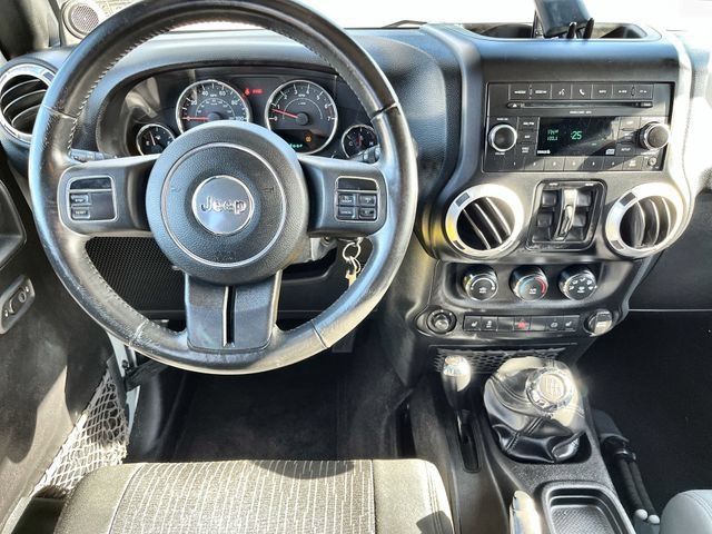 Used 2011 Silver Jeep Sahara image 12