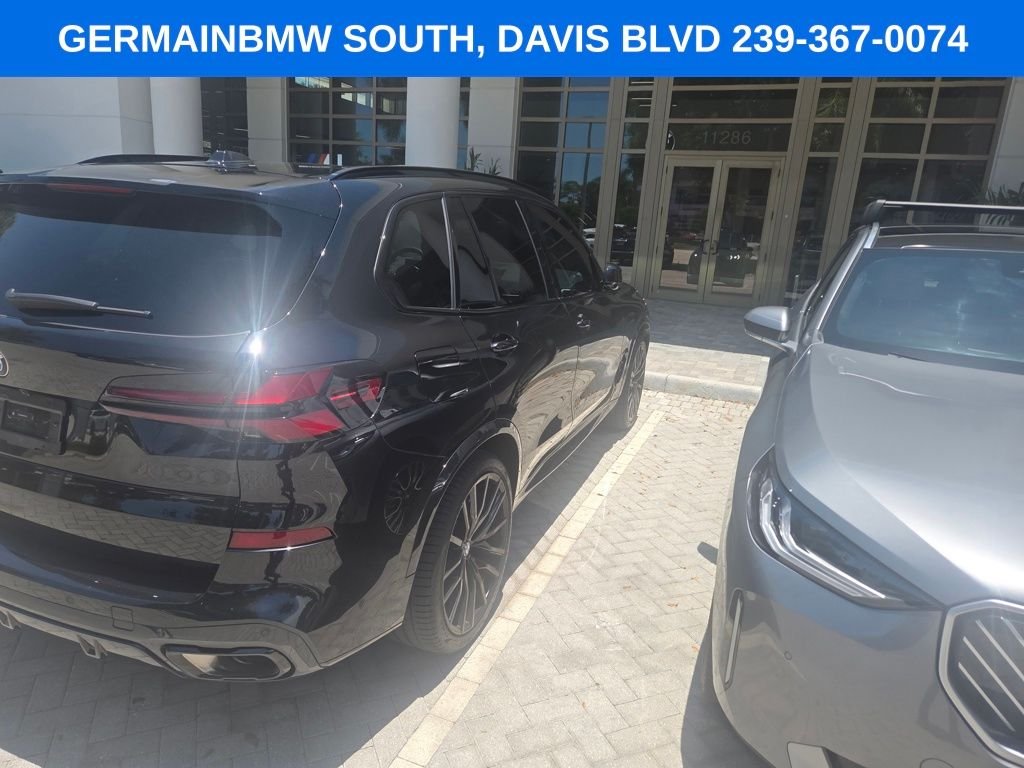 Certified Used 2026 Black Sapphire Metallic BMW sDrive40i image 18