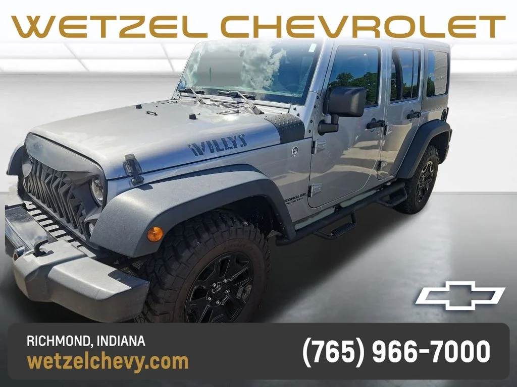 Used 2017 Silver Jeep Unlimited Sport image 1