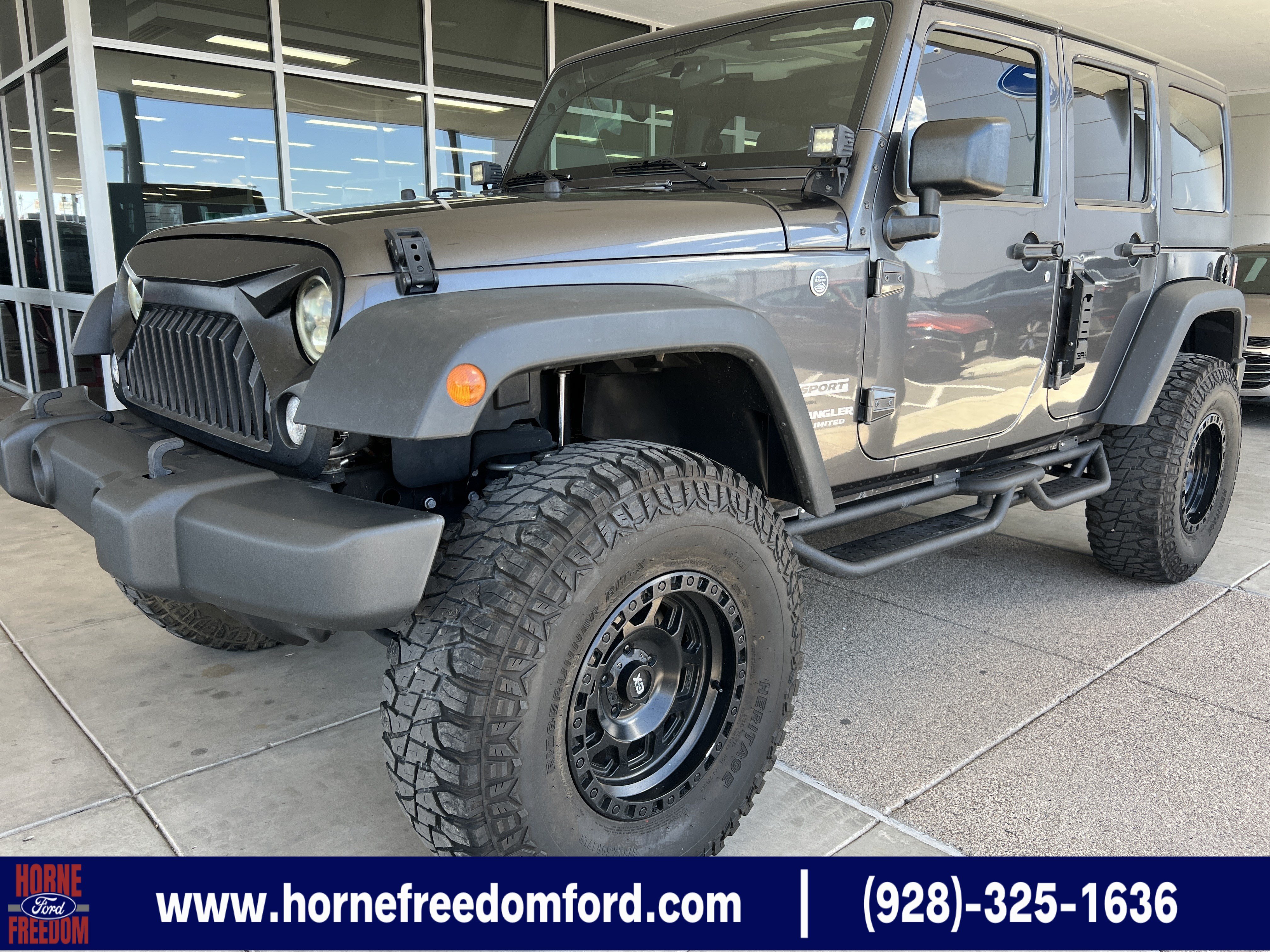 Used 2017 Gray Jeep Sport image 1
