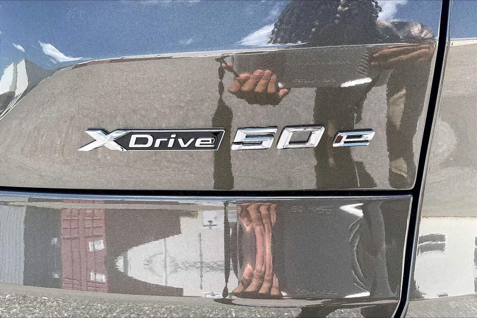 Used 2026 Manhattan Green Metallic BMW xDrive50e image 15