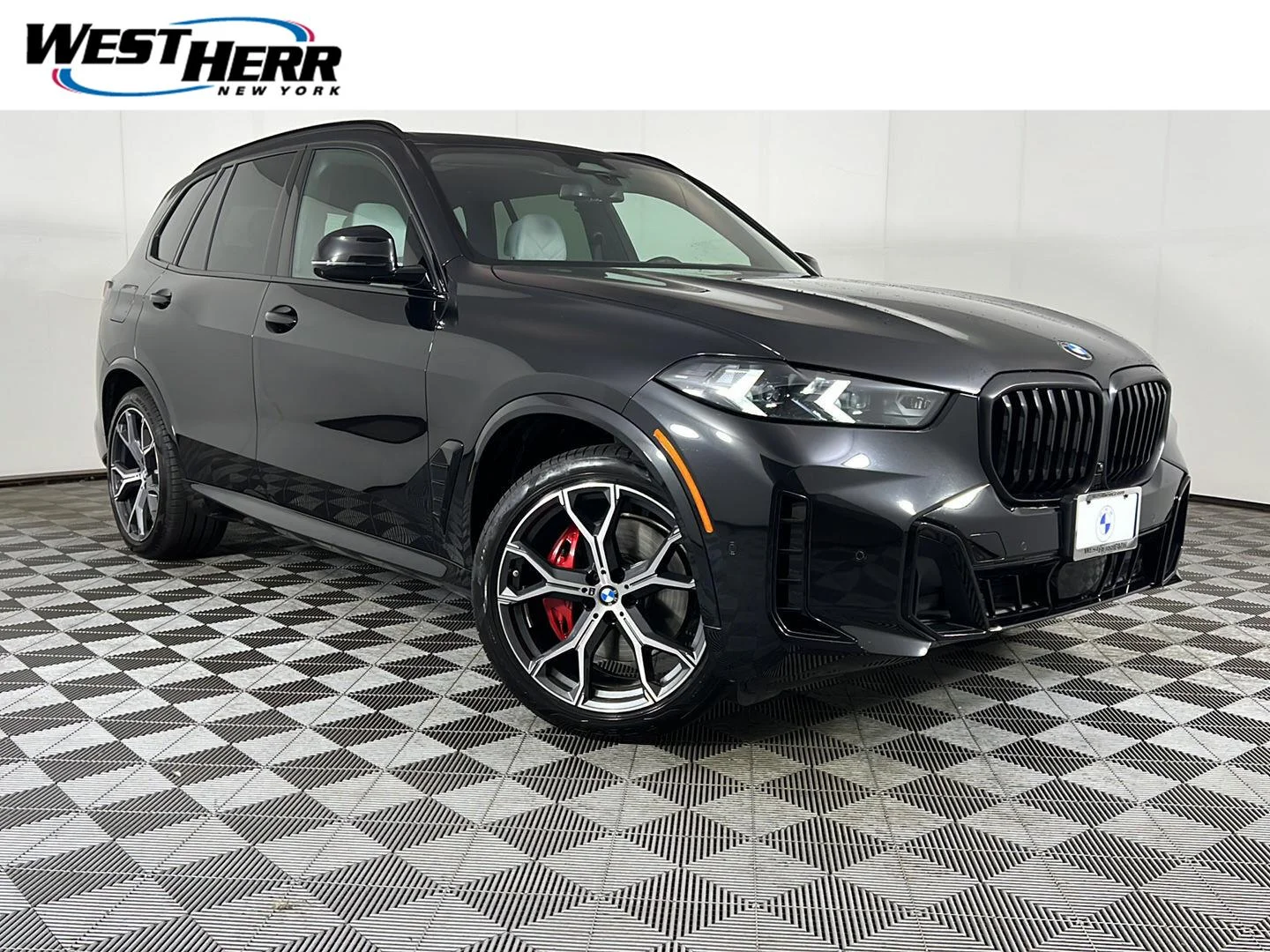 Used 2026 Black Sapphire Metallic BMW xDrive40i image 1