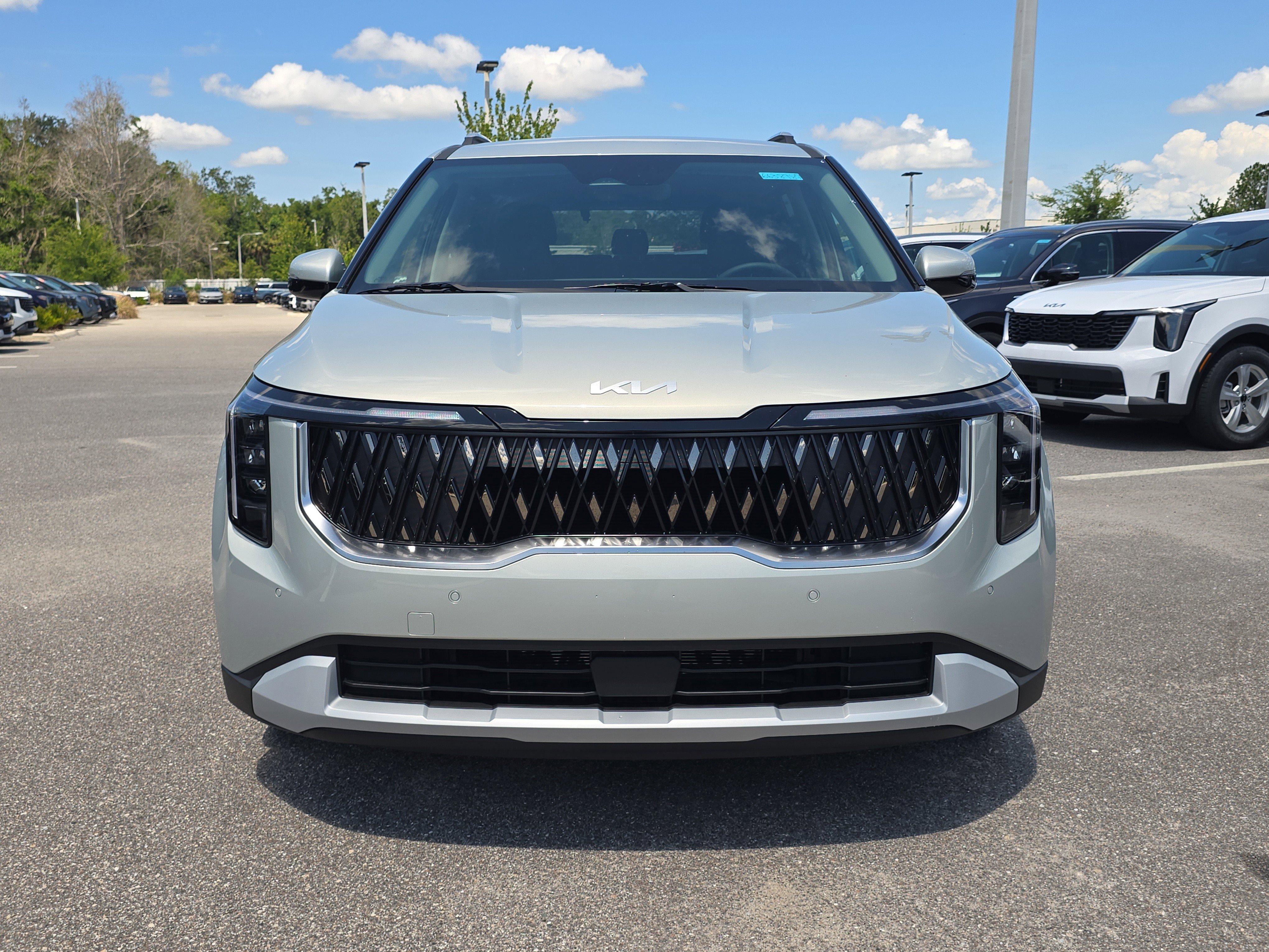 New 2026 Ivory Silver Kia EX image 3