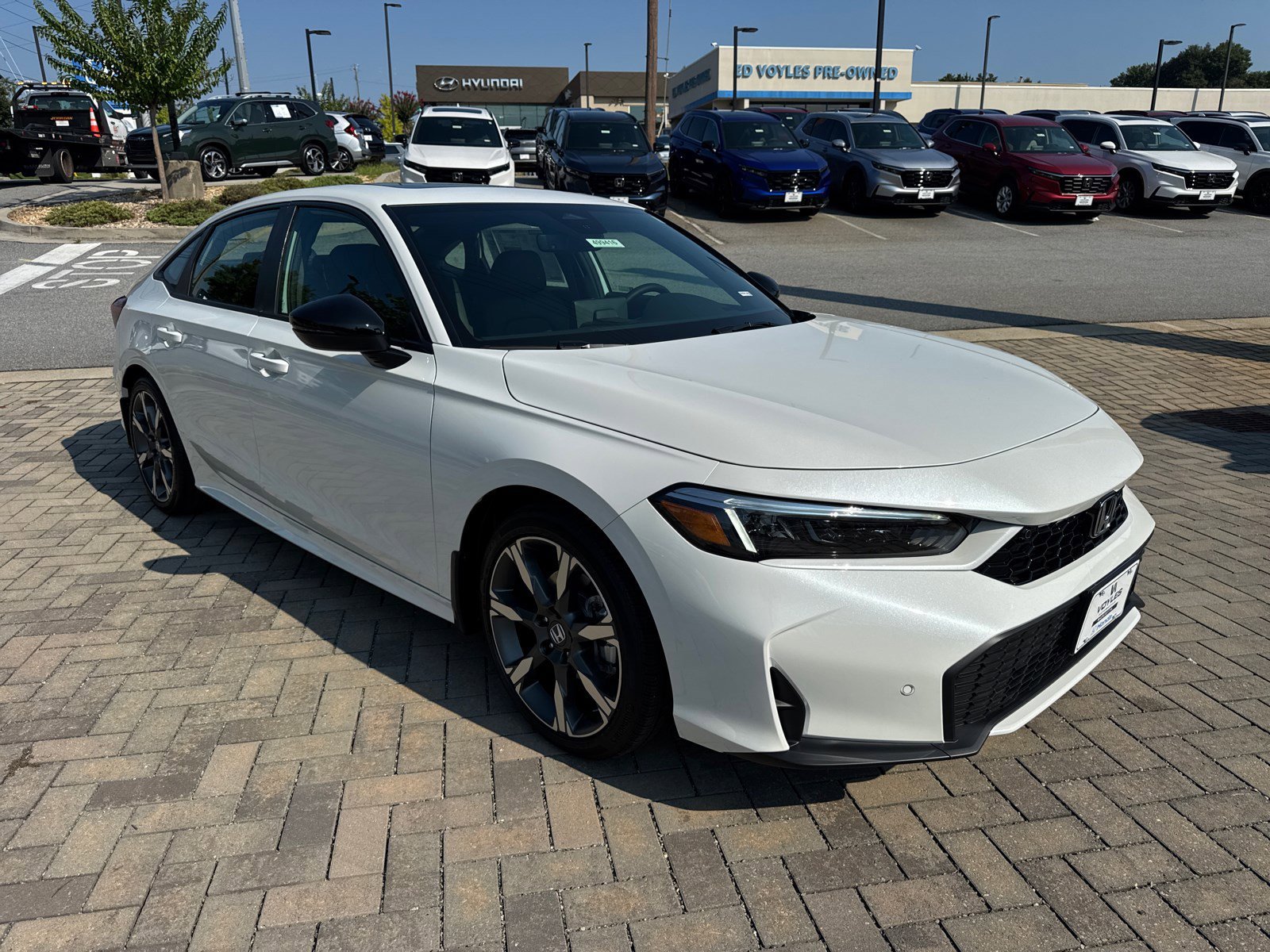 2026 Honda Civic Sport Touring Hybrid CVT's photo