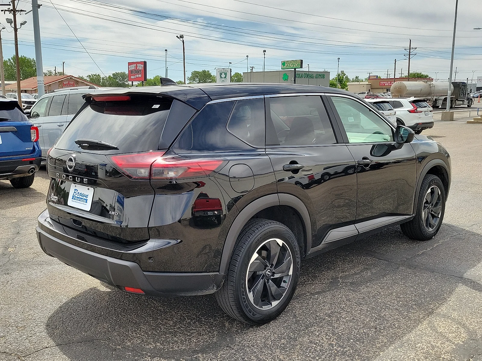 Certified Used 2025 Super Black Nissan SV Intelligent AWD image 11