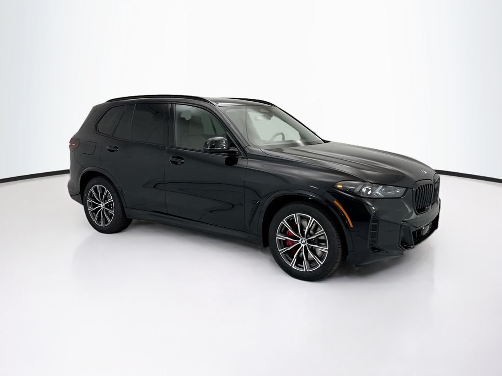 New 2026 Black Sapphire Metallic BMW xDrive50e image 3