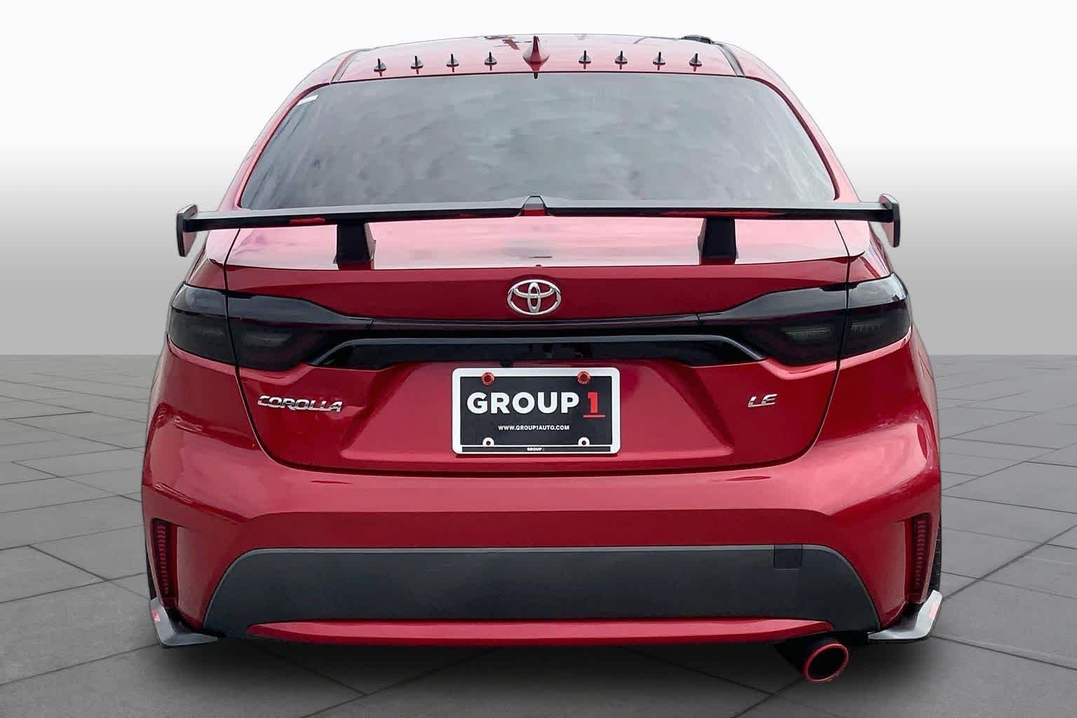 Used 2020 Barcelona Red Metallic Toyota LE image 4