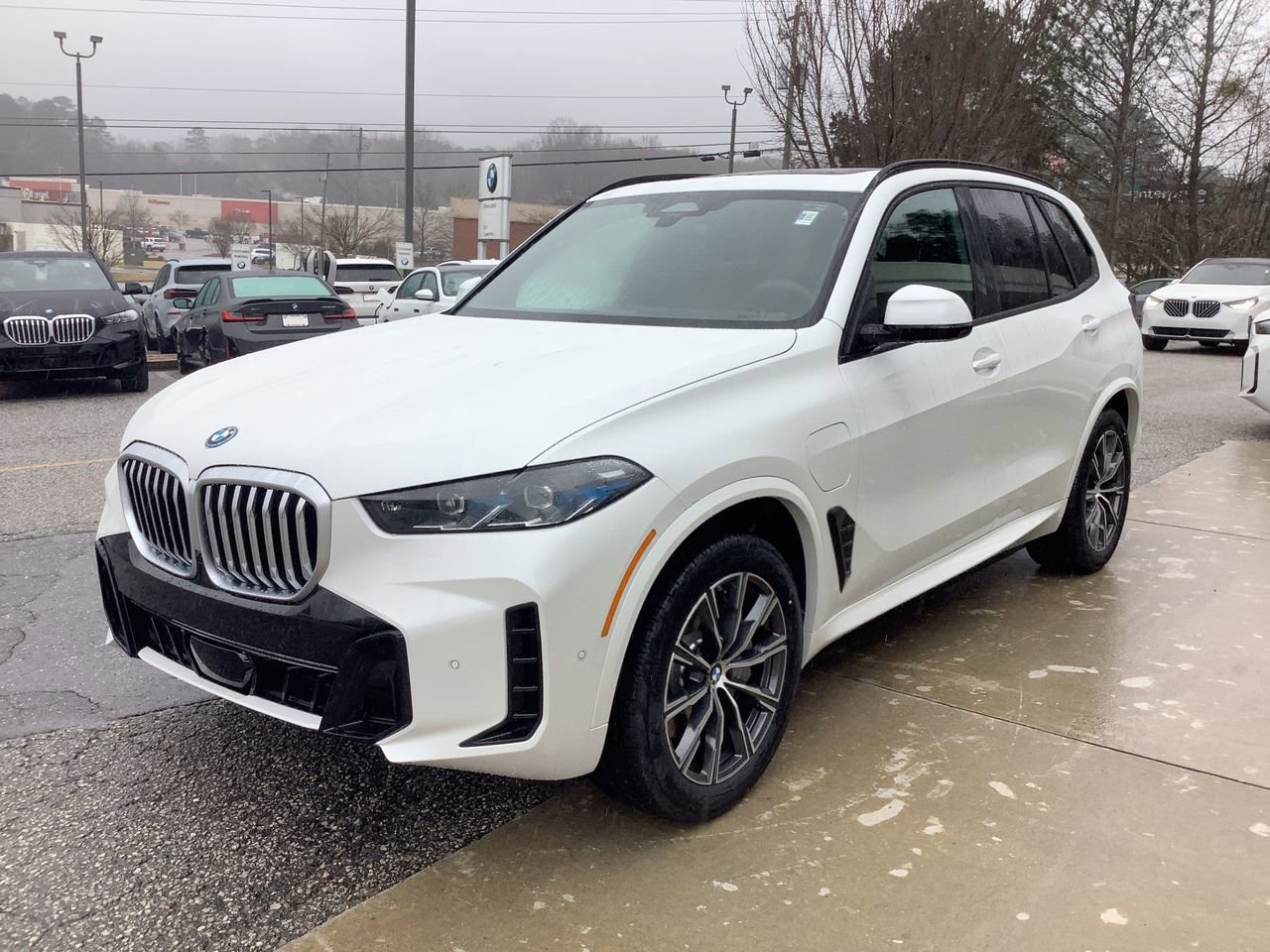 Used 2026 Mineral White Metallic BMW xDrive50e image 4