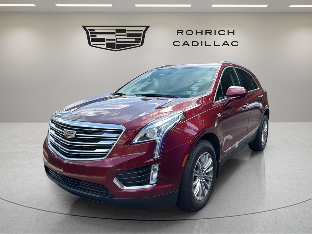 Used 2018 RED PASSION TINTCOAT Cadillac Luxury AWD image 1