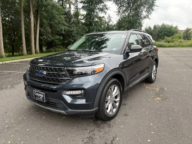 Certified Used 2023 Blue Metallic Ford XLT image 1