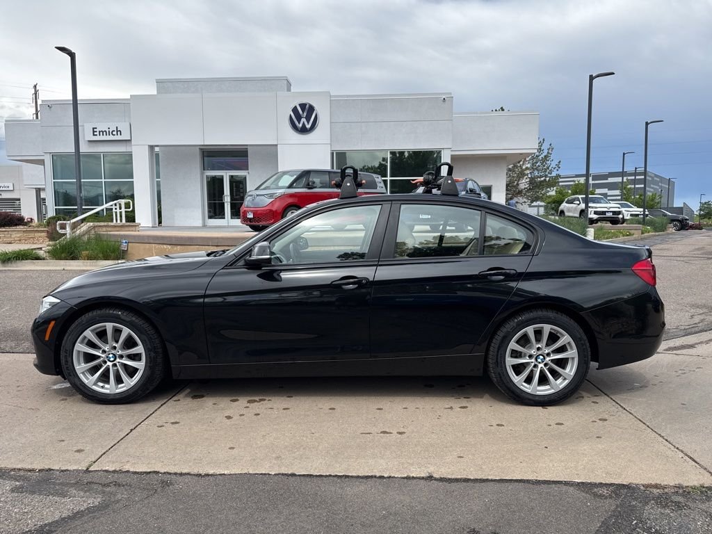 Used 2018 Black Sapphire Metallic BMW 320i xDrive image 2