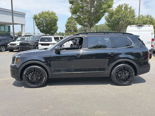Used 2025 Black Kia EX X-Line image 10