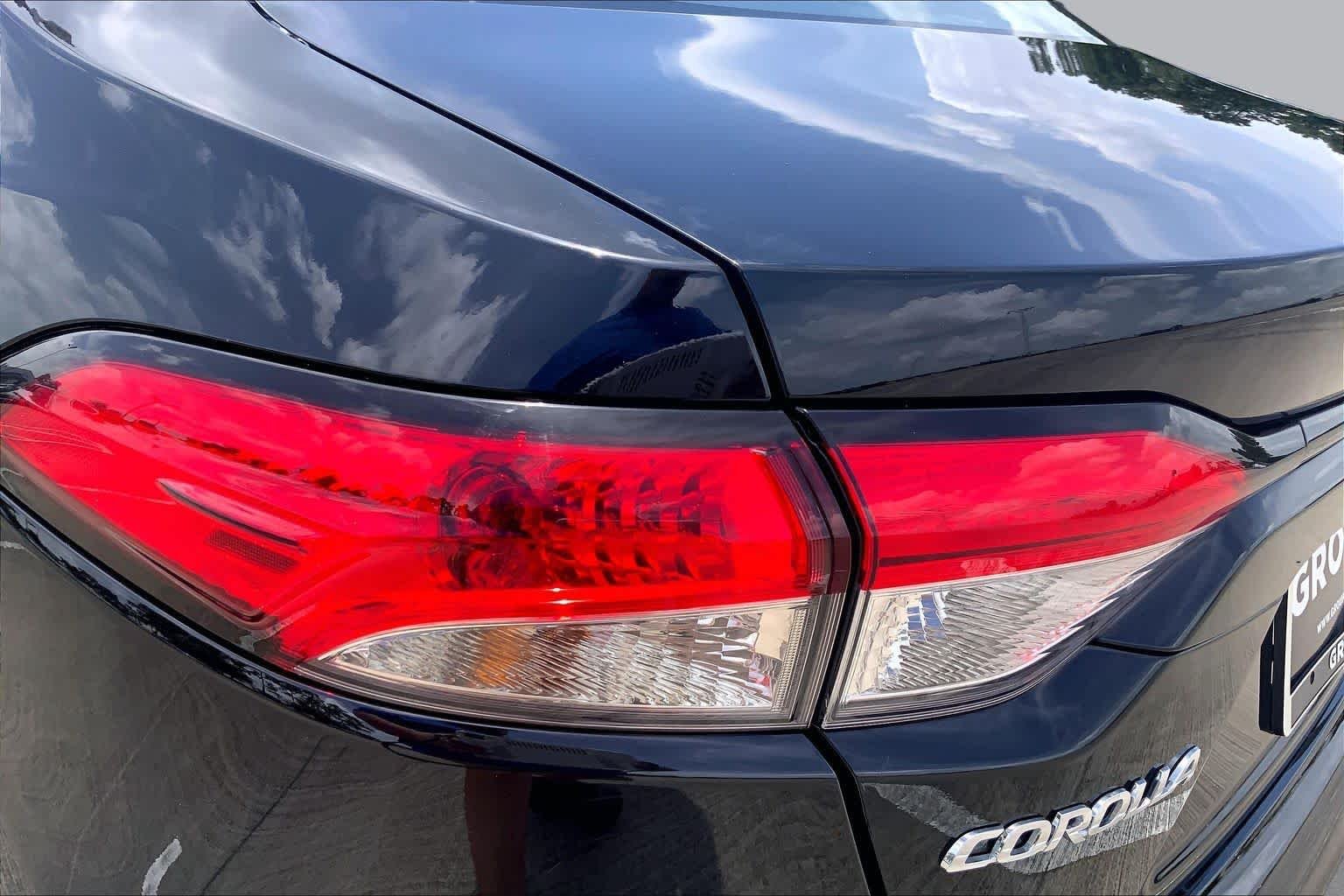 Used 2024 Midnight Black Metallic Toyota LE image 28