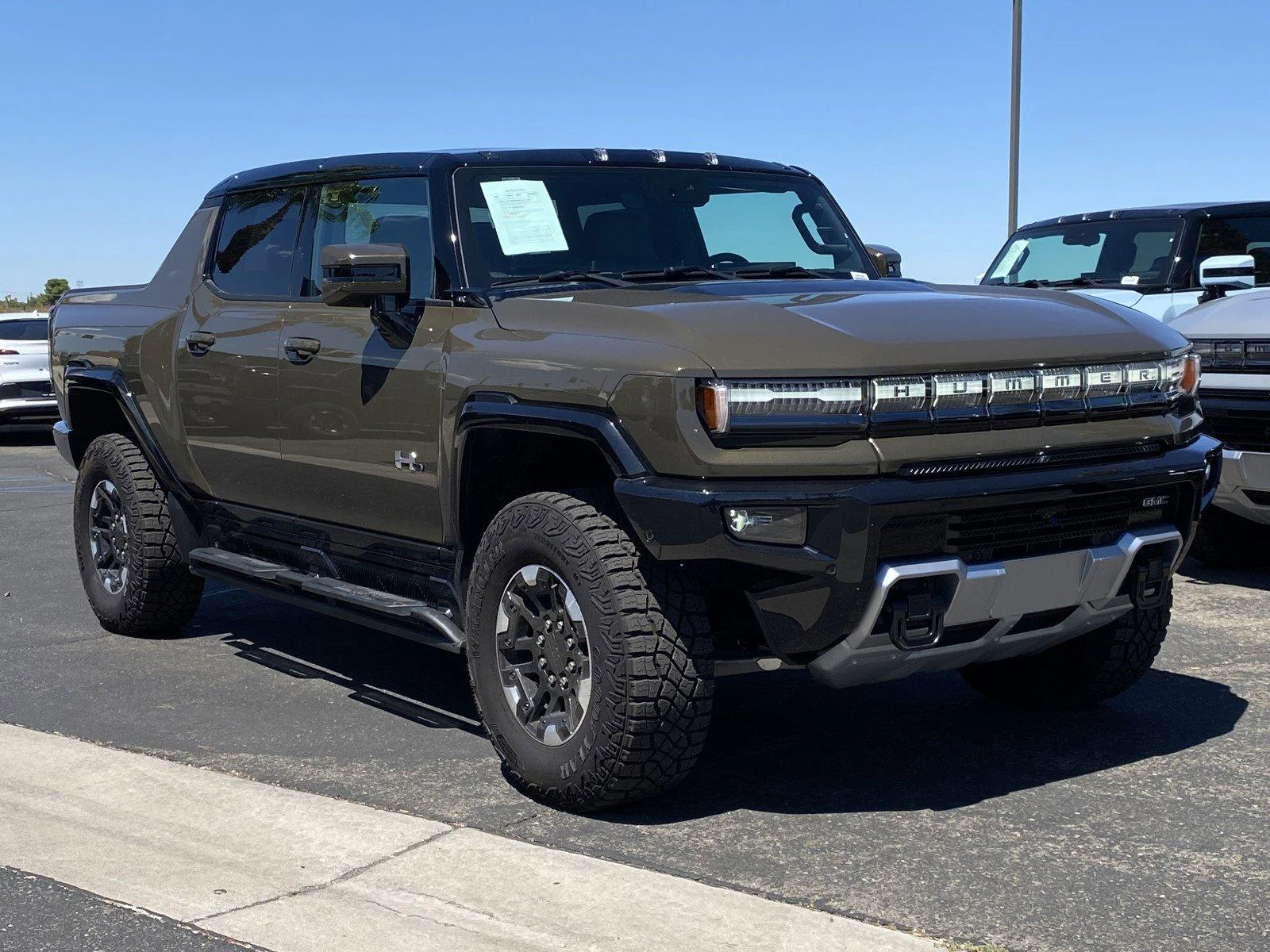 New 2025 Deep Aurora Metallic (Dark Bronze) GMC 3X image 1