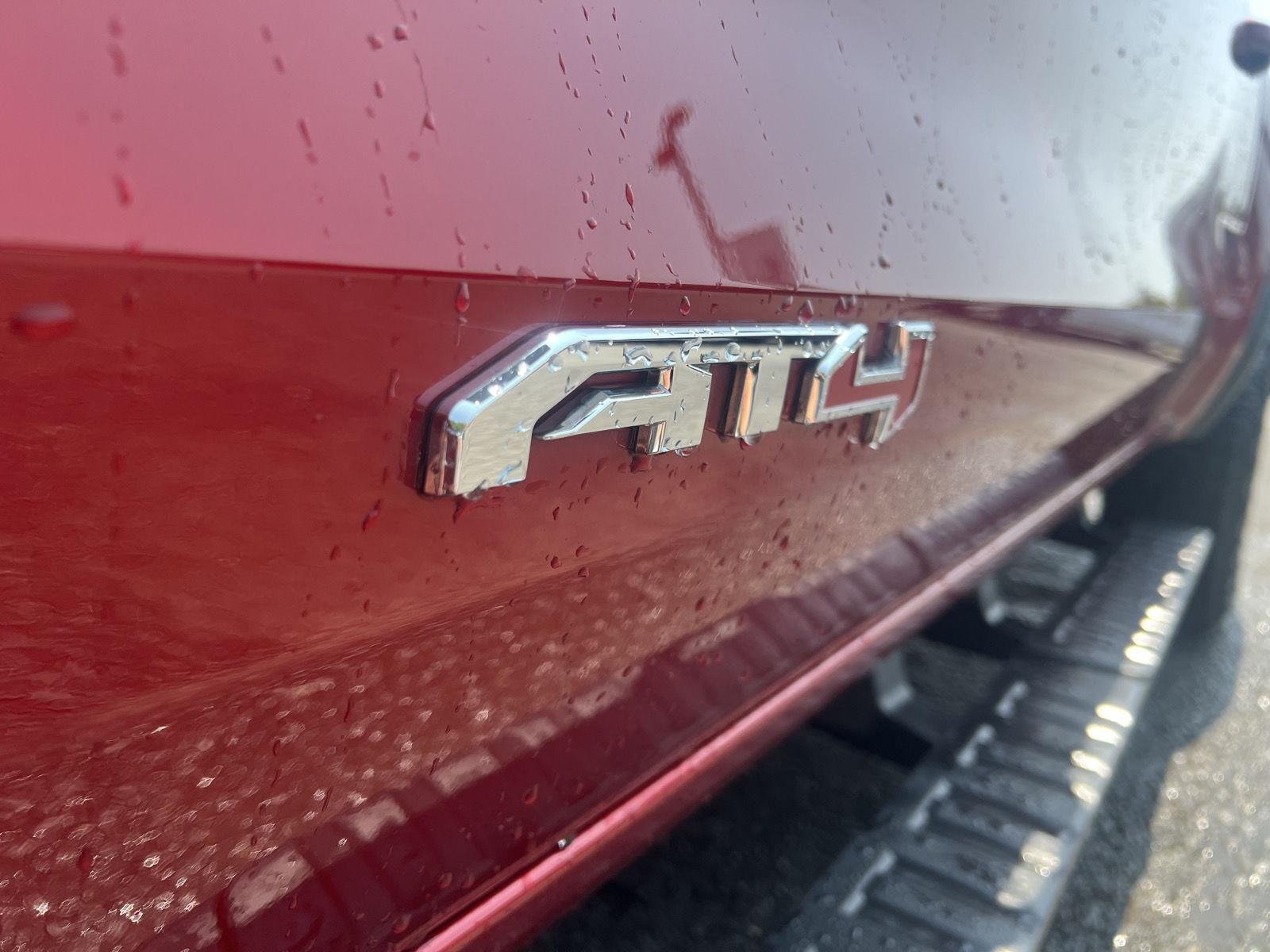 Used 2024 Volcanic Red Tintcoat GMC 4WD AT4 image 9