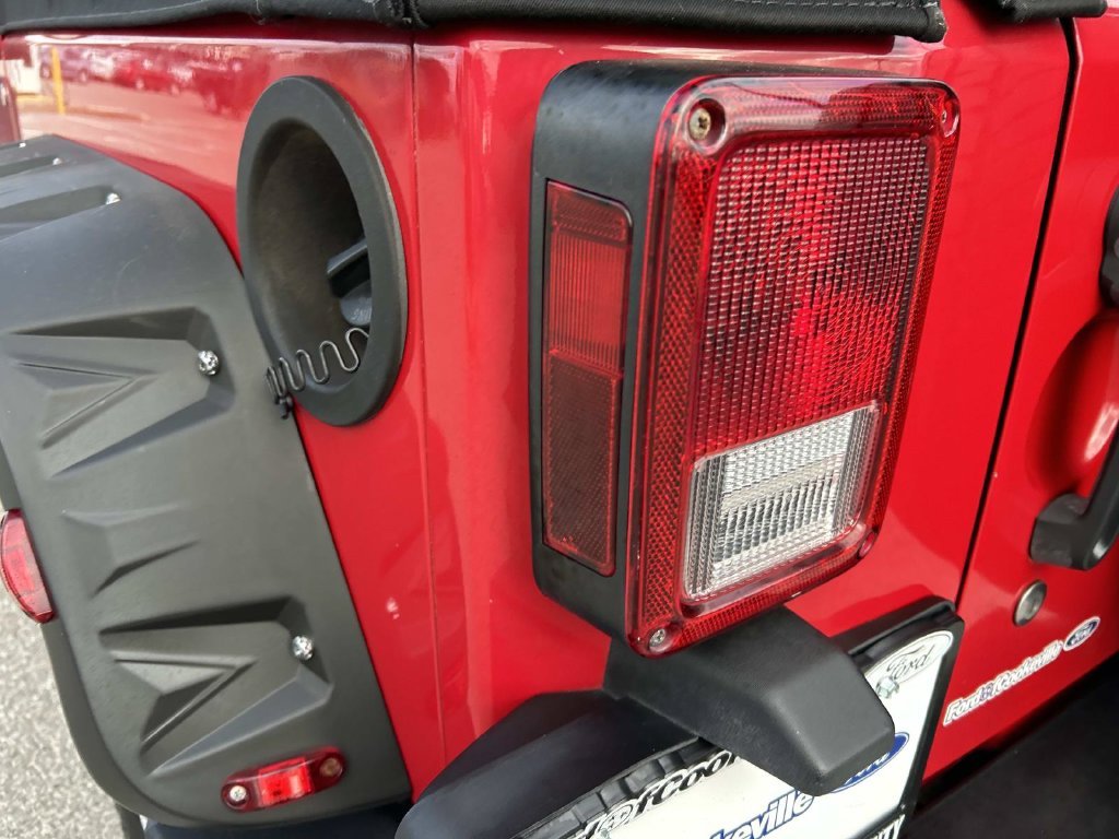 Used 2011 Flame Red Jeep Sport image 11