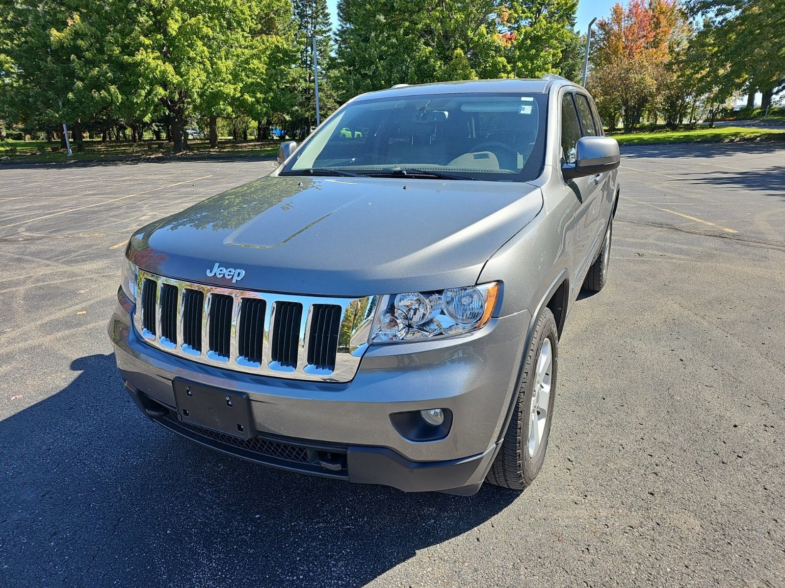 Used 2013 Jeep Grand Cherokee Laredo X with VIN 1C4RJFAG7DC501636 for sale in Urbandale, IA