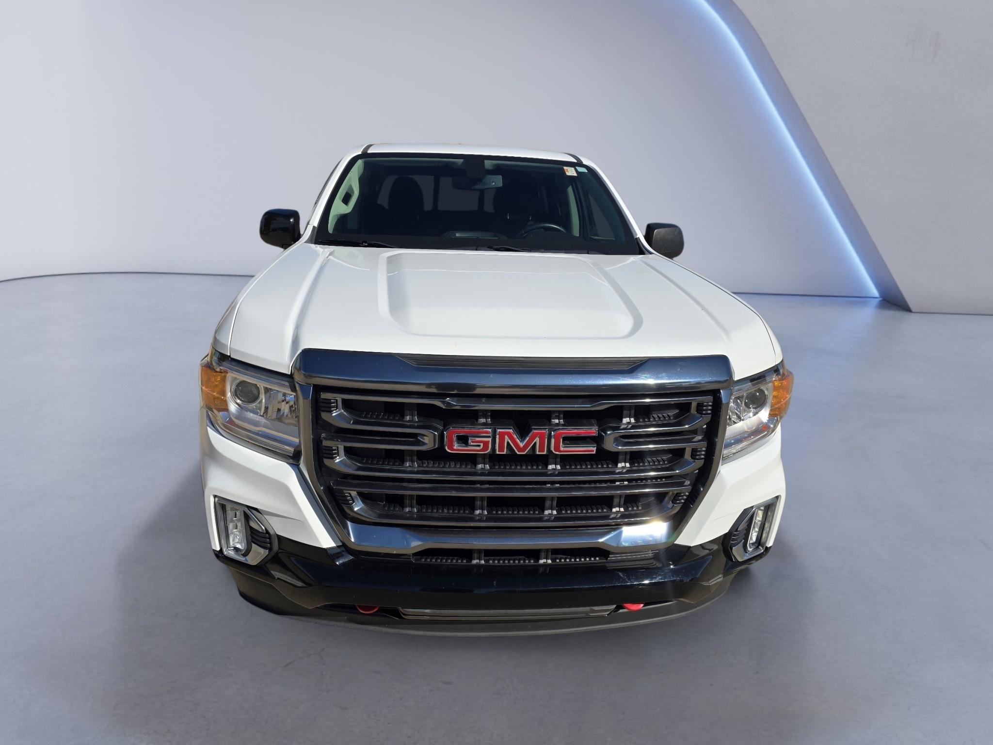 Used 2021 Summit White GMC 4WD AT4 w/Cloth image 8