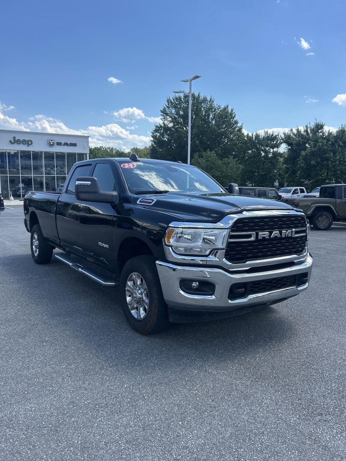 Used 2024 Diamond Black Crystal Pearlcoat Ram Big Horn image 1