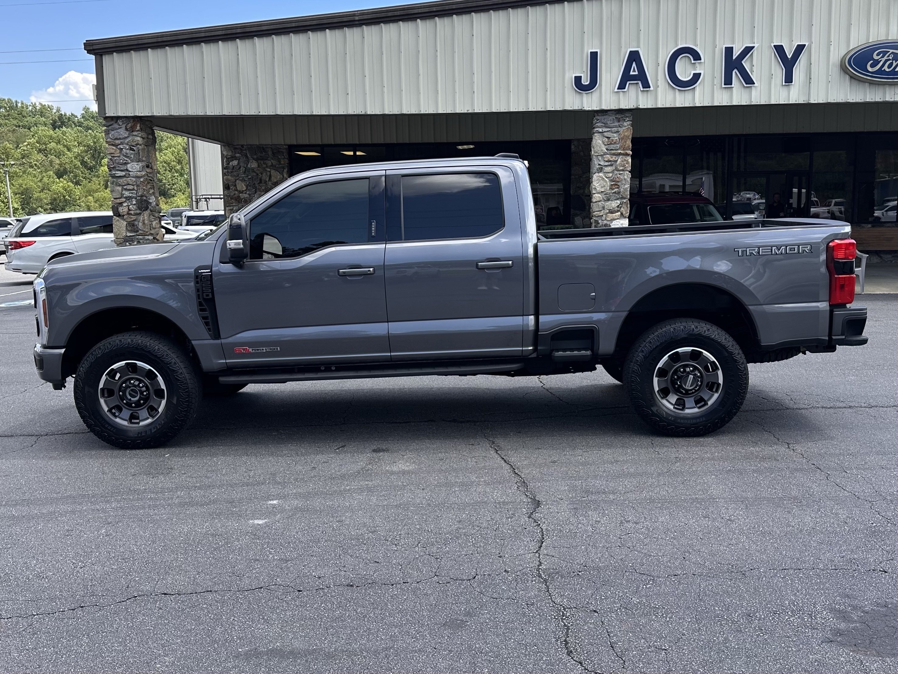 Certified Used 2024 Light Blue Clearcoat Metallic Ford Lariat Tremor image 1