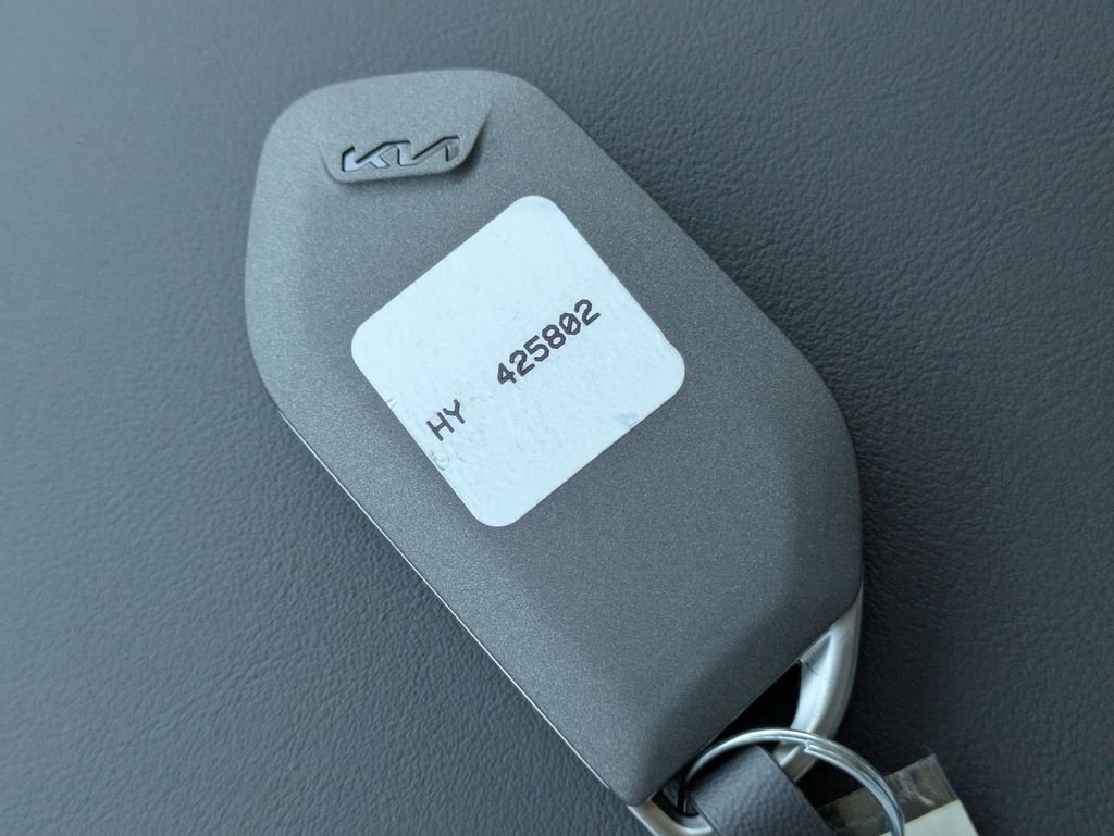 New 2026 Ivory Silver Kia LX image 33