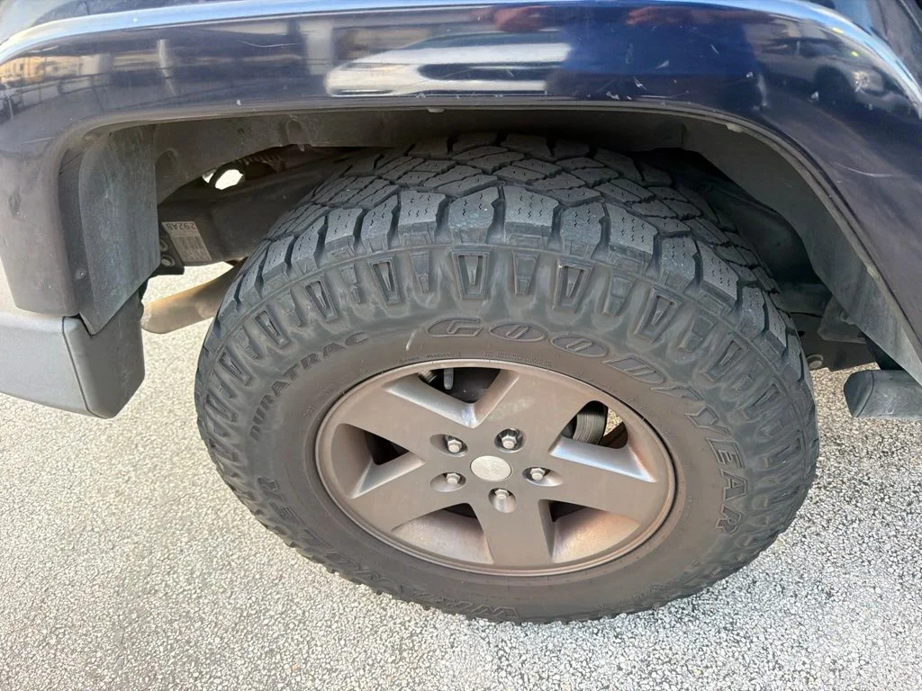 Used 2013 True Blue Pearlcoat Jeep Unlimited Freedom Edition image 12