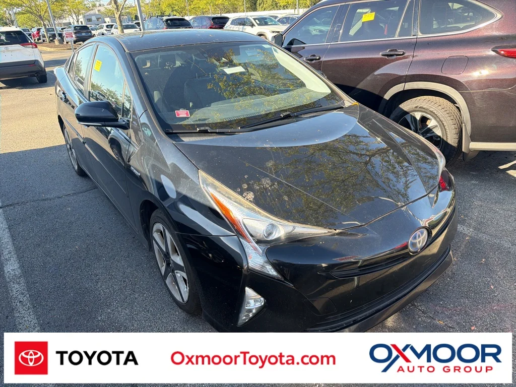 Used 2016 Midnight Black Metallic Toyota Three Touring image 1
