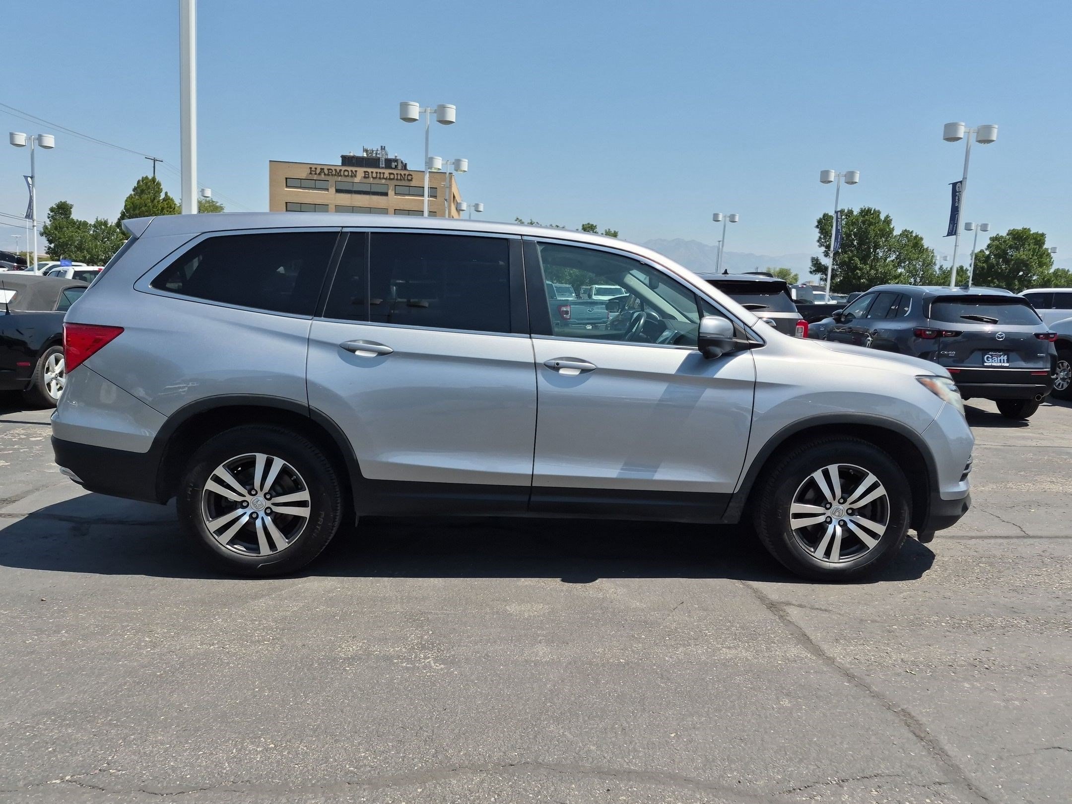 Used 2016 Honda Pilot EX-L with VIN 5FNYF6H80GB125171 for sale in West Valley City, UT