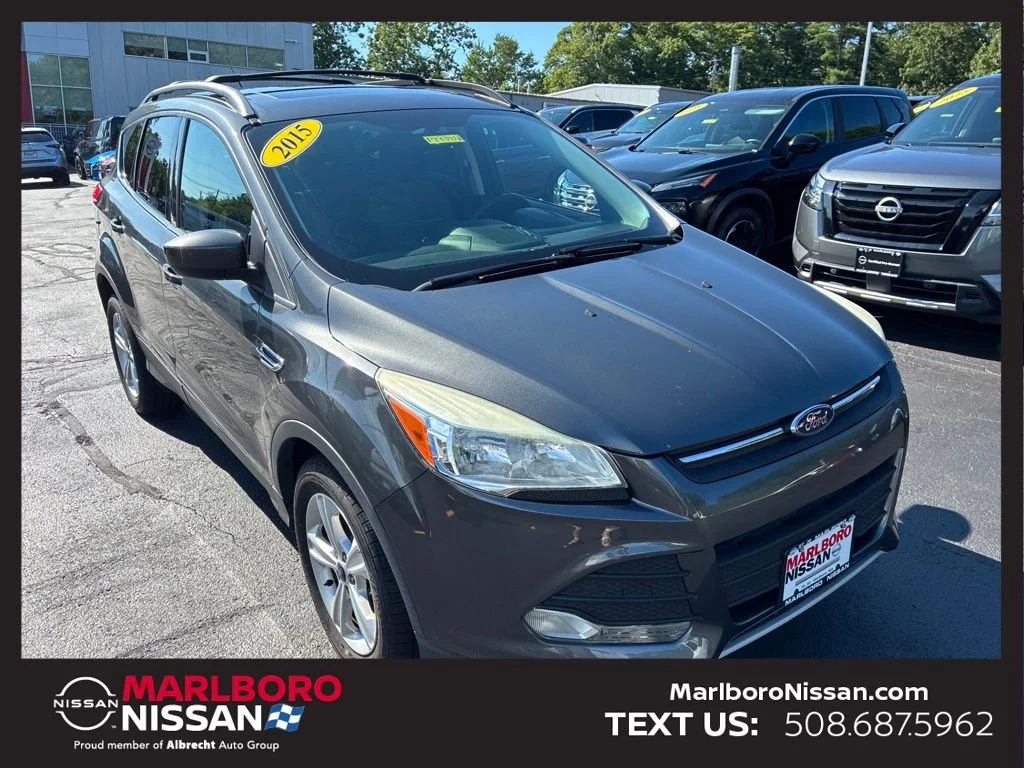Used 2015 Gray Ford SE image 1