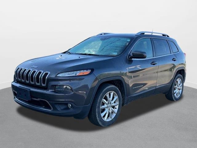 Used 2016 Granite Crystal Metallic Clearcoat Jeep Limited image 1