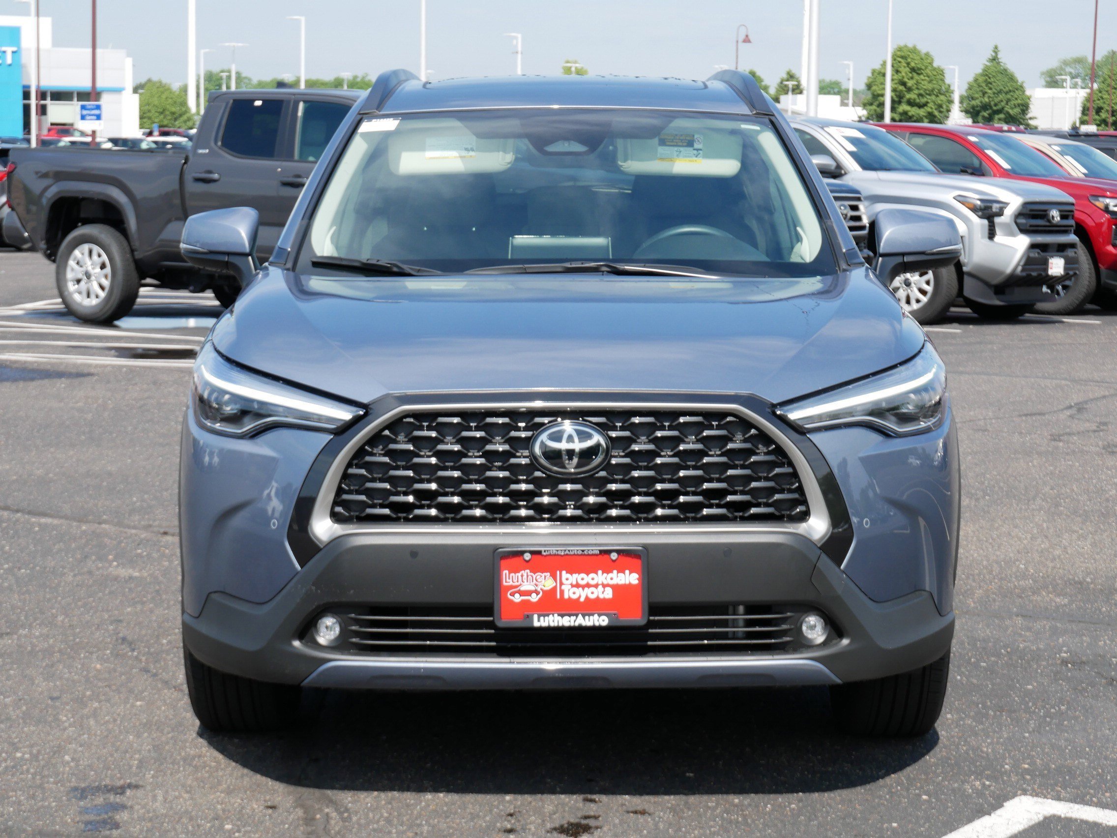 Used 2023 Toyota Corolla Cross XLE with VIN 7MUDAABG6PV078388 for sale in Brooklyn Center, Minnesota