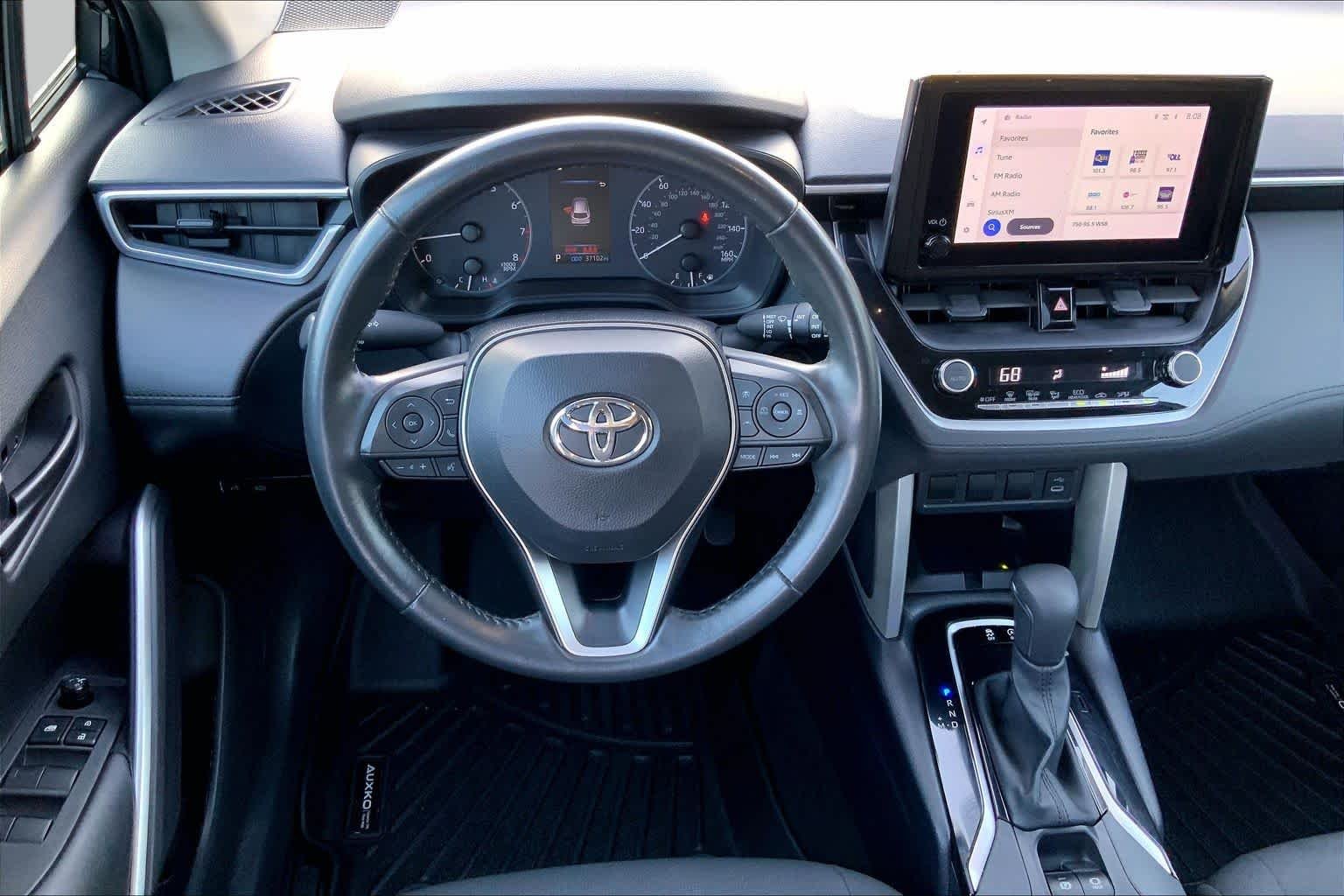Used 2024 Jet Black Toyota LE image 6