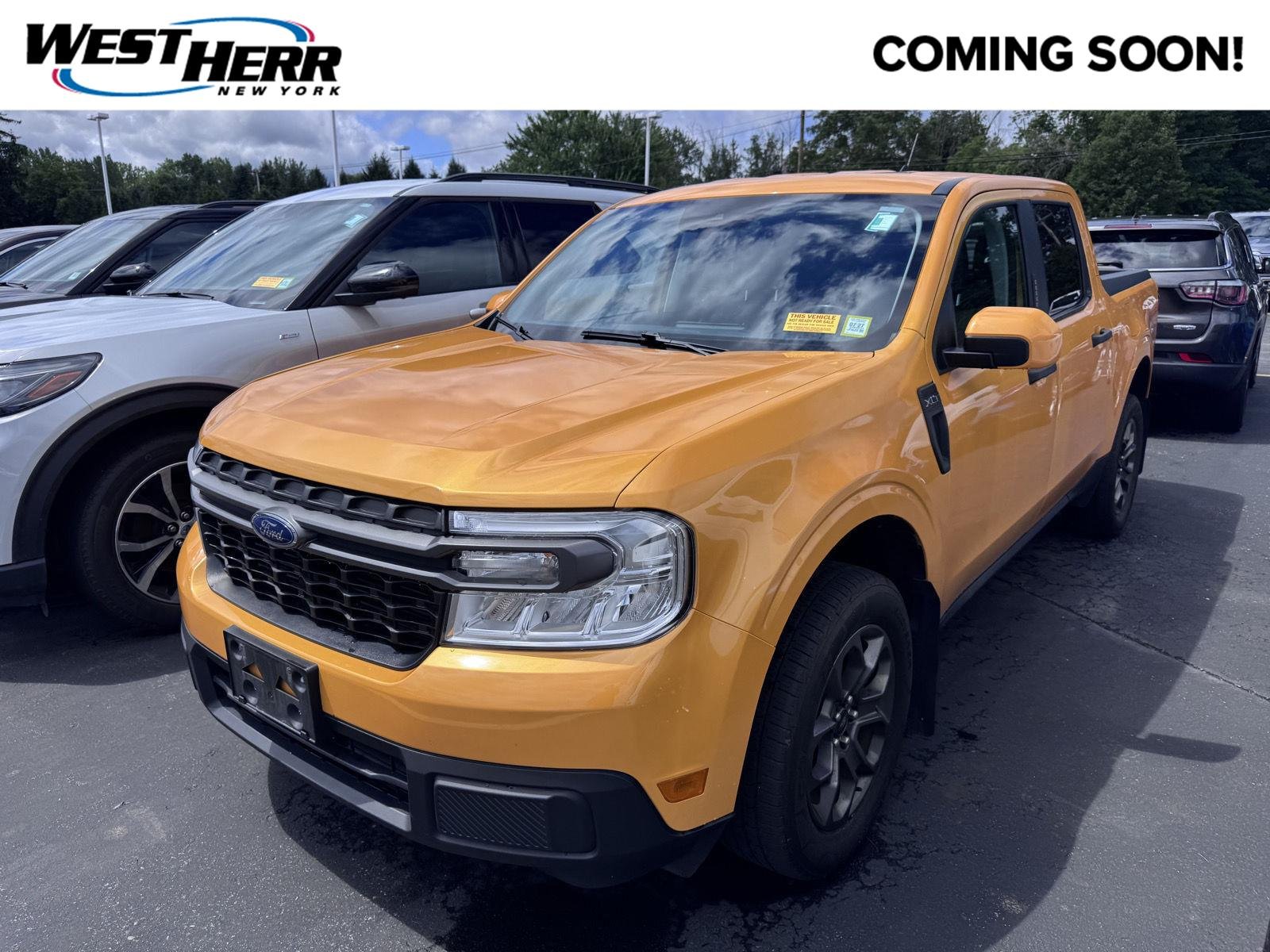 Used 2023 Cyber Orange Metallic Tri-Coat Ford XLT image 1