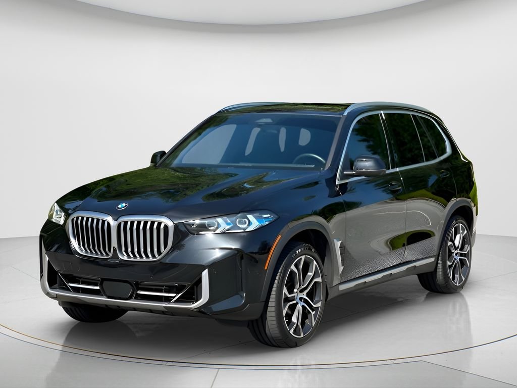 Certified Used 2025 Black Sapphire Metallic BMW xDrive40i image 1