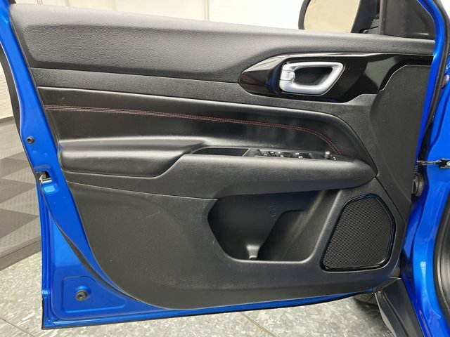 Used 2023 Laser Blue Pearlcoat Jeep Trailhawk image 6